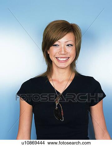 Picture - Young Woman Smiling, Portrait, Front View . Fotosearch
