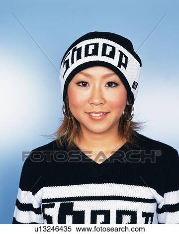 Stock Photography - Young Woman Smiling, Portrait, Front View . Fotosearch