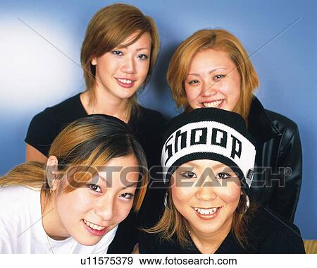 Young Women Smiling, Portrait, One Woman Wearing Knit Cap, Front View View Large Photo Image Stock Photo - Young Women Smiling, Portrait, One Woman Wearing Knit Cap, Front View . Fotosearch