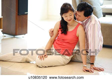 View of a couple smiling. View Large Photo Image Stock Image - View of a couple smiling.. Fotosearch