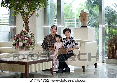 View of a girl with her grandparent. View Large Photo Image Stock Image - View of a girl with her grandparent.. Fotosearch