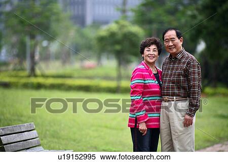 View of aged couple looking at camera. View Large Photo Image Stock Photography - View of aged couple looking at camera.. Fotosearch