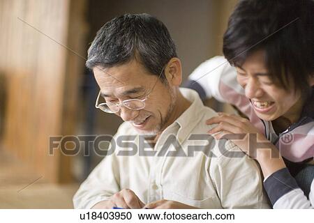A Father and His Son Smiling Together, Side View, Differential Focus View Large Photo Image Stock Image - A Father and His Son Smiling Together, Side View, Differential Focus. Fotosearch
