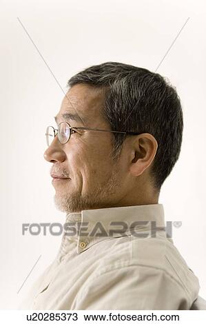 A Mature Adult Man Smiling, Side View, Portrait View Large Photo Image Stock Image - A Mature Adult Man Smiling, Side View, Portrait. Fotosearch