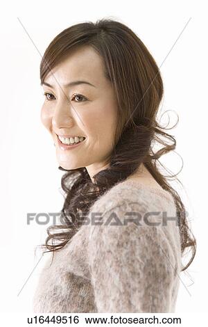 A Mature Adult Woman Smiling, Side View, Portraint View Large Photo Image Stock Photograph - A Mature Adult Woman Smiling, Side View, Portraint. Fotosearch