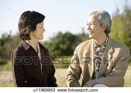 A Mature Couple Having a Conversation, Waist Up View Large Photo Image Stock Image - A Mature Couple Having a Conversation, Waist Up. Fotosearch