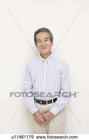 A Portrait of a Senior Adult Man Smiling at Camera, Front View View Large Photo Image Stock Photo - A Portrait of a Senior Adult Man Smiling at Camera, Front View. Fotosearch