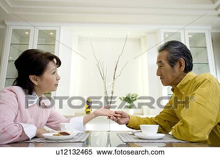 A Senior Adult Couple Having a Tea Break Together, Side View View Large Photo Image Stock Photography - A Senior Adult Couple Having a Tea Break Together, Side View. Fotosearch