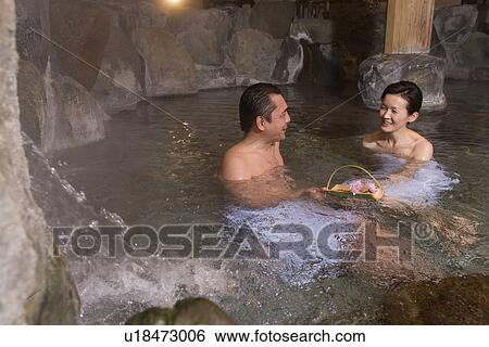 Mature Adult Couple Soaking in a Hot Spring Together, Side View, Head and Shoulder View Large Photo Image Stock Photograph - Mature Adult Couple Soaking in a Hot Spring Together, Side View, Head and Shoulder. Fotosearch