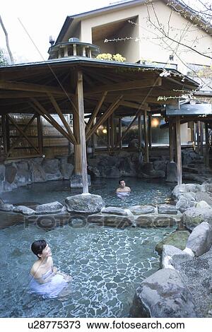 Mature Adult Couple Taking a Hot Spring Bath Separately, Side View, High Angle View, Head and Shoulder View Large Photo Image Stock Image - Mature Adult Couple Taking a Hot Spring Bath Separately, Side View, High Angle View, Head and Shoulder. Fotosearch