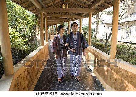 Mature Adult Couple Walking Arm in Arm, Front View, Full Length View Large Photo Image Stock Photography - Mature Adult Couple Walking Arm in Arm, Front View, Full Length. Fotosearch