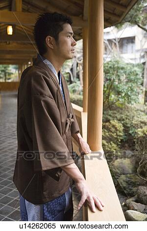 A Mid Adult Man in Yukata, Standing on the Outdoor Corridor, Side View View Large Photo Image Stock Photography - A Mid Adult Man in Yukata, Standing on the Outdoor Corridor, Side View. Fotosearch
