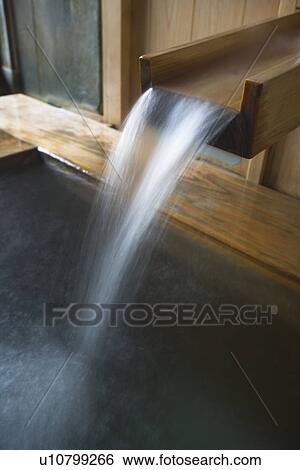 Image of a Wooden Water Outlet of Japanese Hot Spring, Close Up, Long Exposure View Large Photo Image Stock Photograph - Image of a Wooden Water Outlet of Japanese Hot Spring, Close Up, Long Exposure. Fotosearch