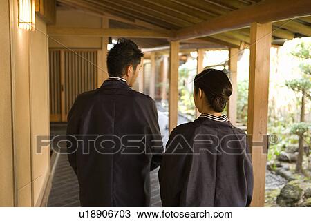 Mid Adult Couple in Yukata, Walking on the Outside Corridor, Rear View View Large Photo Image Stock Image - Mid Adult Couple in Yukata, Walking on the Outside Corridor, Rear View. Fotosearch