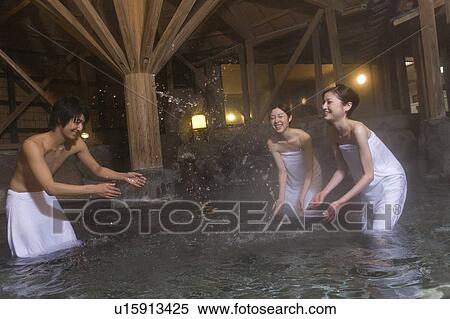 Man and women playing in a hot tub, front view, side view, Japan View Large Photo Image Stock Photography - Man and women playing in a hot tub, front view, side view, Japan. Fotosearch