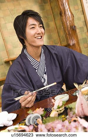 Man in Yukata having dinner in the room, front view, Japan View Large Photo Image Stock Image - Man in Yukata having dinner in the room, front view, Japan. Fotosearch