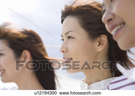 Close Up Image of Three Young Women, Side Face, Side View, Differential Focus View Large Photo Image Stock Image - Close Up Image of Three Young Women, Side Face, Side View, Differential Focus. Fotosearch