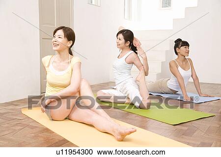 Three Young Women Practicing Yoga, Side View View Large Photo Image Stock Image - Three Young Women Practicing Yoga, Side View. Fotosearch