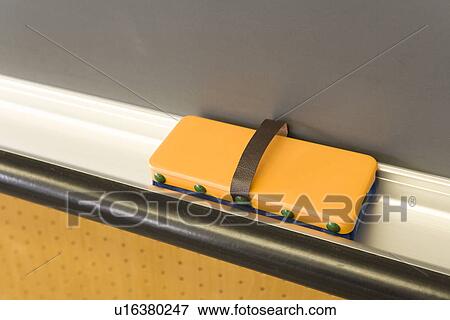 Stock Photo - Blackboard and eraser, high angle view, close up. Fotosearch