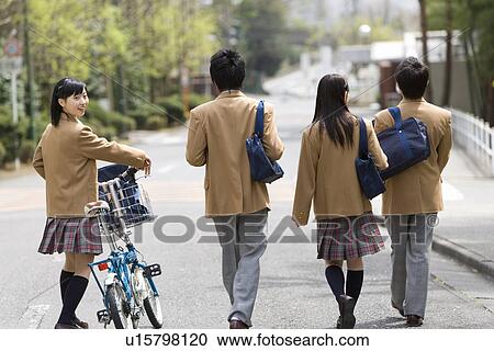Four high school students walking down the street together, side by side, portrait for a girl, rear view, Japan View Large Photo Image Stock Image - Four high school students walking down the street together, side by side, portrait for a girl, rear view, Japan. Fotosearch