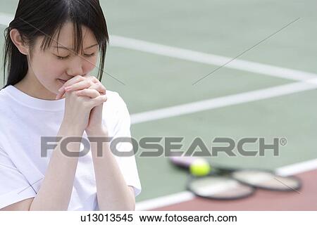 Teenage girl in gym cloth praying in tennis court, front view View Large Photo Image Stock Photography - Teenage girl in gym cloth praying in tennis court, front view. Fotosearch