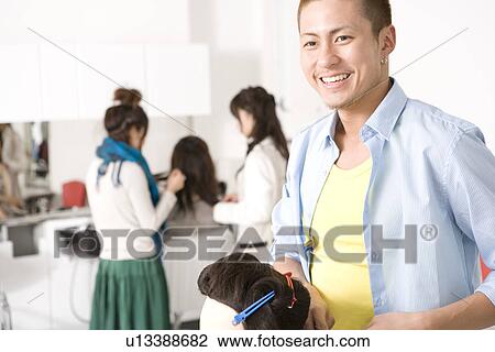 Stock Image - Beauty College Students in Class. Fotosearch