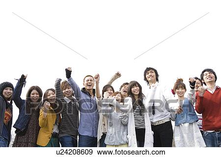 Stock Photo - College Students Holding Their Arms in the Air. Fotosearch