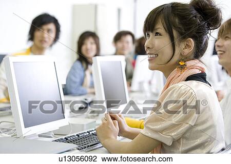 Stock Image - College Students in Computer Laboratory. Fotosearch
