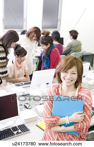 Stock Image - College Students in Computer Laboratory. Fotosearch