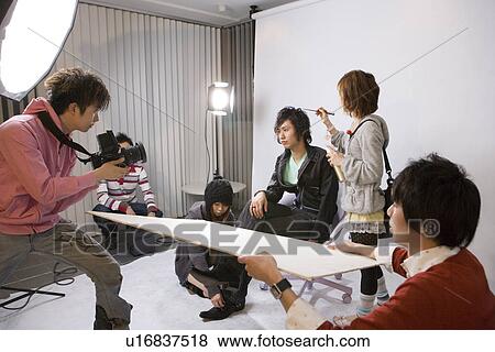 College Students Shooting Photographs in Studio View Large Photo Image Stock Photo - College Students Shooting Photographs in Studio. Fotosearch