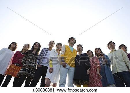 Stock Image - Eleven College Students Standing in Line. Fotosearch