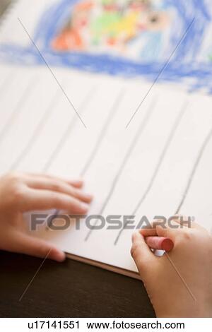 Stock Image - Girl drawing, close up. Fotosearch
