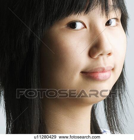Stock Photo - Portrait of girl posing. Fotosearch