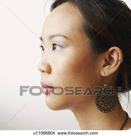 Picture - Side profile of a young woman. Fotosearch