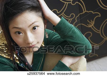 Picture - High angle view of a teenage girl. Fotosearch