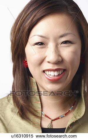 Stock Photography - Portrait of a businesswoman smiling. Fotosearch