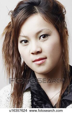 Portrait of a young woman View Large Photo Image Picture - Portrait of a young woman. Fotosearch