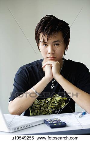 Portrait of a boy looking upset View Large Photo Image Stock Photography - Portrait of a boy looking upset. Fotosearch