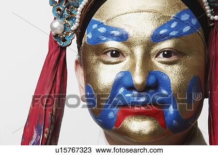 Stock Image - Portrait of a male Chinese opera performer smiling. Fotosearch
