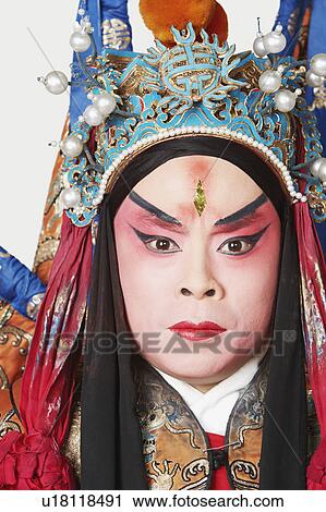 Portrait of a male Chinese opera performer looking serious View Large Photo Image Stock Image - Portrait of a male Chinese opera performer looking serious. Fotosearch