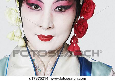 Portrait of a mature woman wearing traditional clothing View Large Photo Image Picture - Portrait of a mature woman wearing traditional clothing. Fotosearch