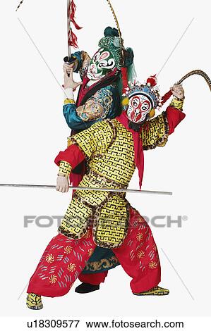 Two male Chinese opera performers gesturing with weapons View Large Photo Image Stock Photo - Two male Chinese opera performers gesturing with weapons. Fotosearch