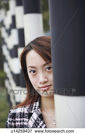 Portrait of a young woman View Large Photo Image Stock Photo - Portrait of a young woman. Fotosearch