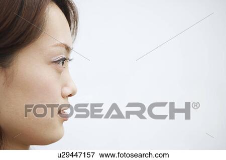 Stock Photo - Close-up of a young woman. Fotosearch