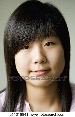 Portrait of a girl smiling View Large Photo Image Stock Image - Portrait of a girl smiling. Fotosearch