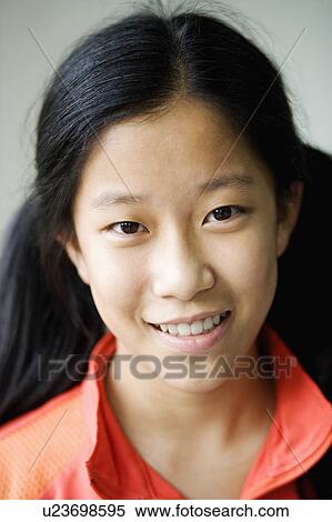 Portrait of a girl smiling View Large Photo Image Stock Photography - Portrait of a girl smiling. Fotosearch