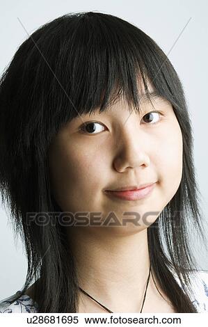 Stock Photography - Portrait of girl making a face. Fotosearch