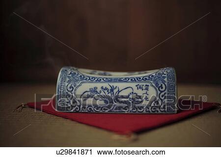 Stock Image - Close-up of an incense burner. Fotosearch