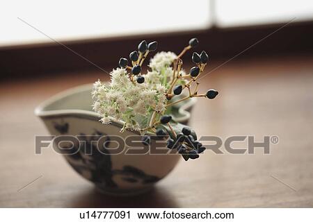 Stock Image - Close-up of flowers in a glass. Fotosearch