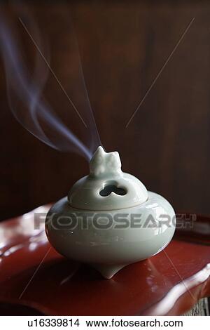 Close-up of white incense burner View Large Photo Image Picture - Close-up of white incense burner. Fotosearch